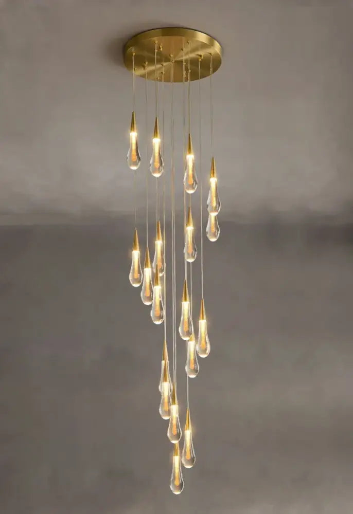 Luxurious gold crystal chandelier with teardrop glass pendants and brass base modern crystal light for staircase
