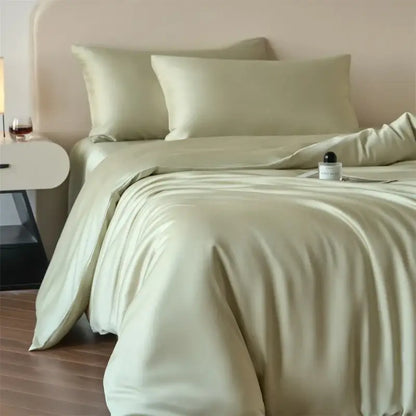 Decorbites luxurious lyocell silk duvet cover set in soft sage green satin with matching fitted sheet and pillowcases
