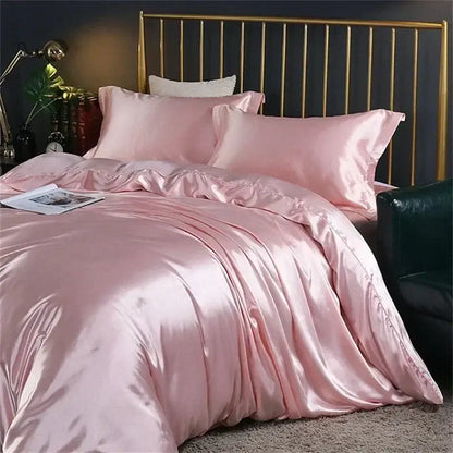 Pink satin mulberry silk bedding set with glossy finish and ruffled edges by decorbites for king and queen sizes