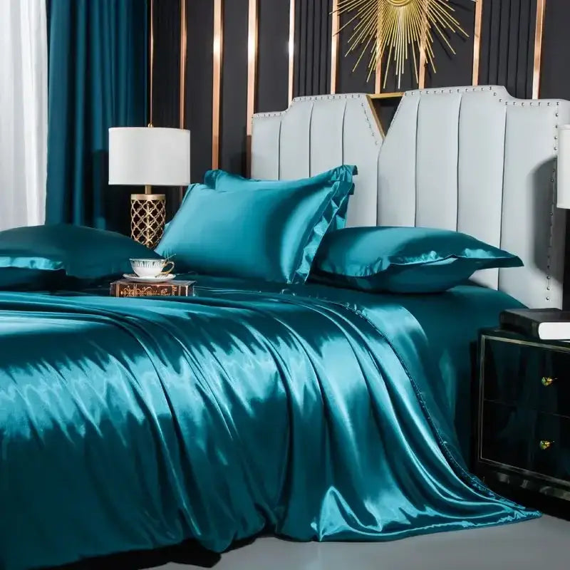 Teal satin duvet cover set with glossy finish and matching pillowcases from DecorBites™ luxurious nordic silk bedding set