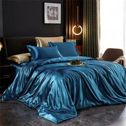 Decorbites luxurious silk bedding set with lustrous teal satin duvet cover and gold-trimmed accent pillows for width bed