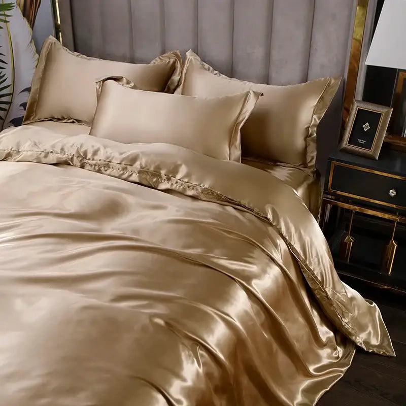Decorbites™ luxurious gold silk bedding set with glossy satin texture and elegant ruffled edges for refined comfort
