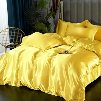 Golden satin bedding set with plush duvet cover and matching pillows from DecorBites™ luxurious silk bedding set pcs duvet cover