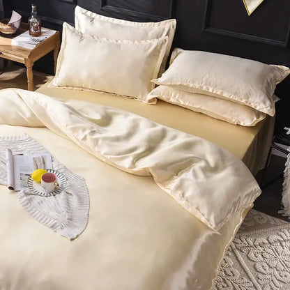 Cream-colored satin bedding set with smooth glossy finish and elegant stitched edges by DecorBites™ Luxurious Silk Bedding Set