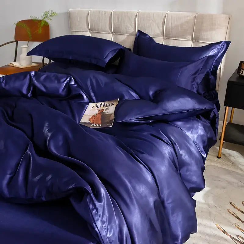 Deep navy satin silk bedding set by decorbites with glossy luxurious finish including bed sheet and duvet cover