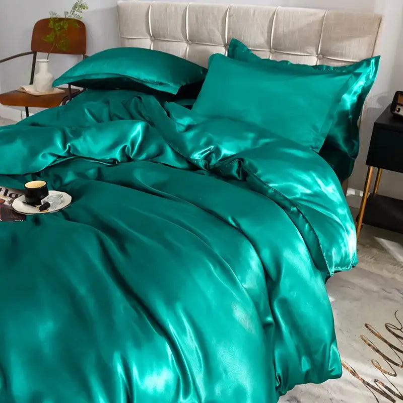 Emerald green satin silk bedding set with a glossy luxurious finish from decorbites silk bedding set collection