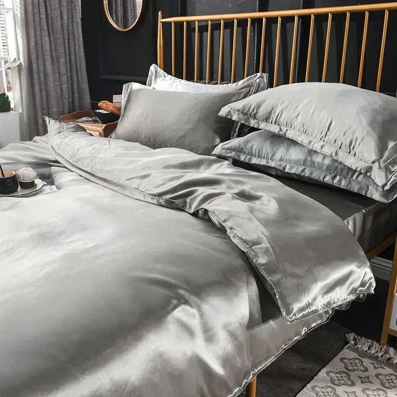 Silk-gray satin silk bedding set by decorbites with smooth lustrous finish and elegant ruffled edges