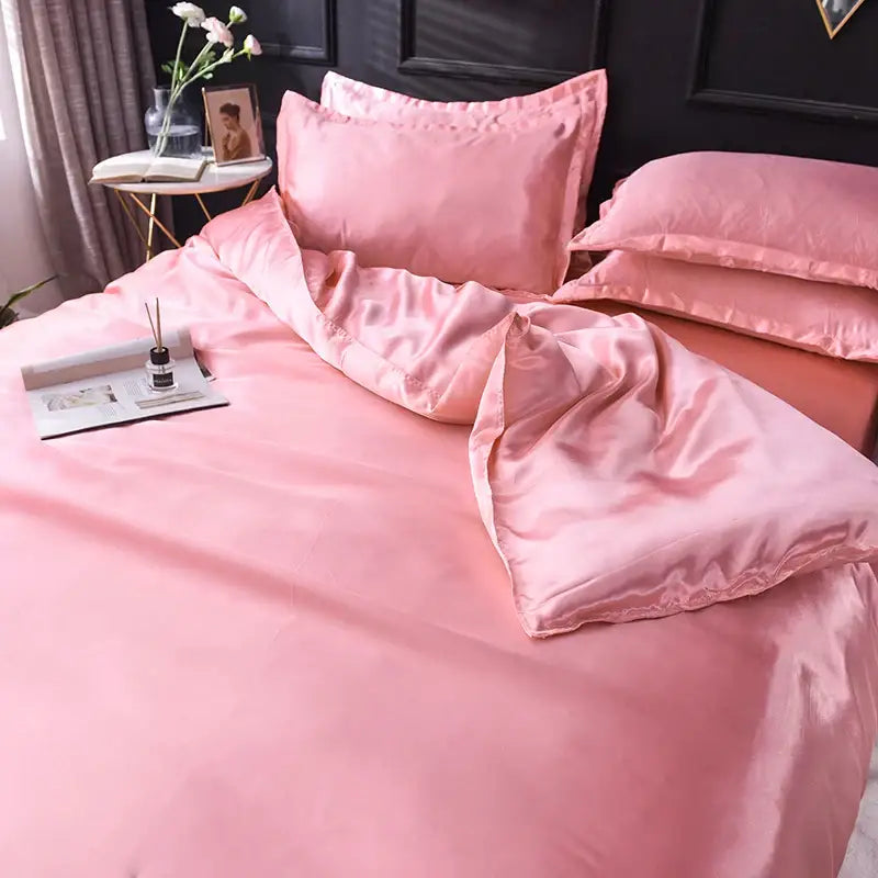 DecorBites Luxurious silk pink satin bedding set with duvet cover and matching pillowcases in smooth glossy finish