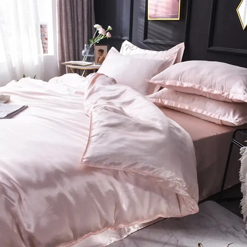 Decorbites™ luxurious silk bedding set with blush pink satin duvet cover and matching pillowcases for elegant bed sheets