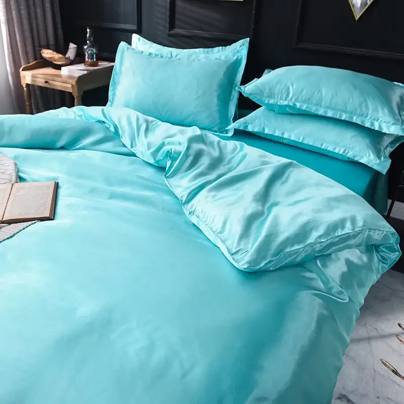 Turquoise satin silk bedding set by decorbites with smooth glossy finish includes bed sheet and duvet cover