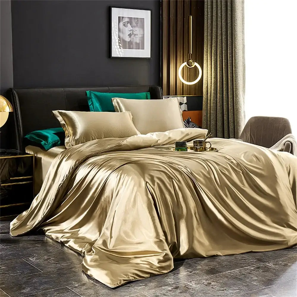 Decorbites™ luxurious solid silk duvet cover set in gold satin with matching and teal accent pillows on modern bed
