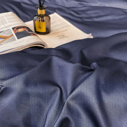 Deep navy satin duvet cover with subtle woven texture from DecorBites™ luxurious Egyptian cotton bedding set