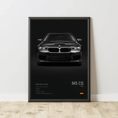 Black framed canvas wall art featuring a matte bmw m5 cs 2021 with signature kidney grille and aggressive front fascia
