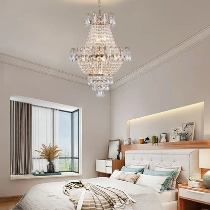 DecorBites luxury retro crystal chandelier with copper color metal frame and clear faceted glass elements hanging from ceiling