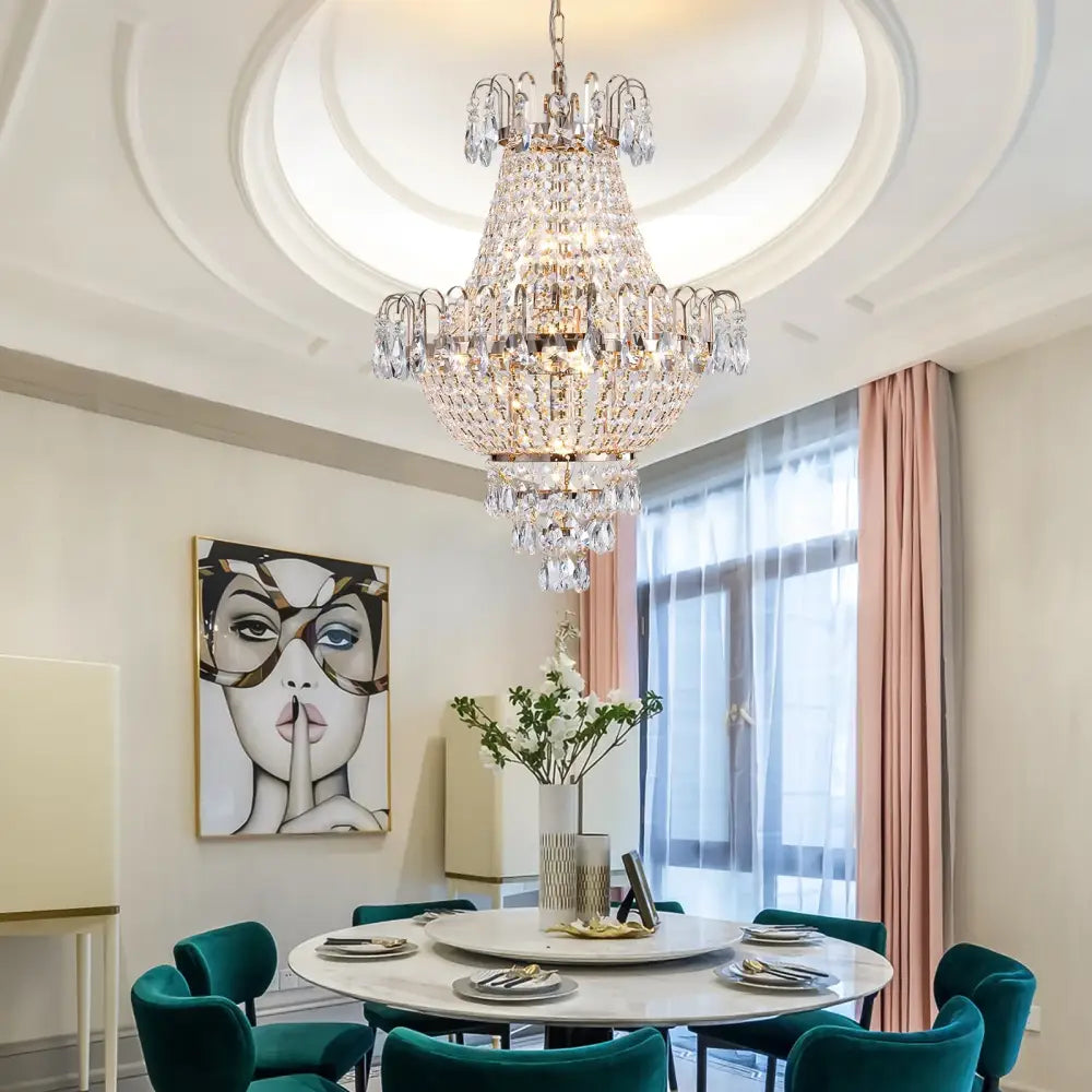 A luxury retro crystal chandelier with a tiered design and copper color featuring seven sparkling light fixtures