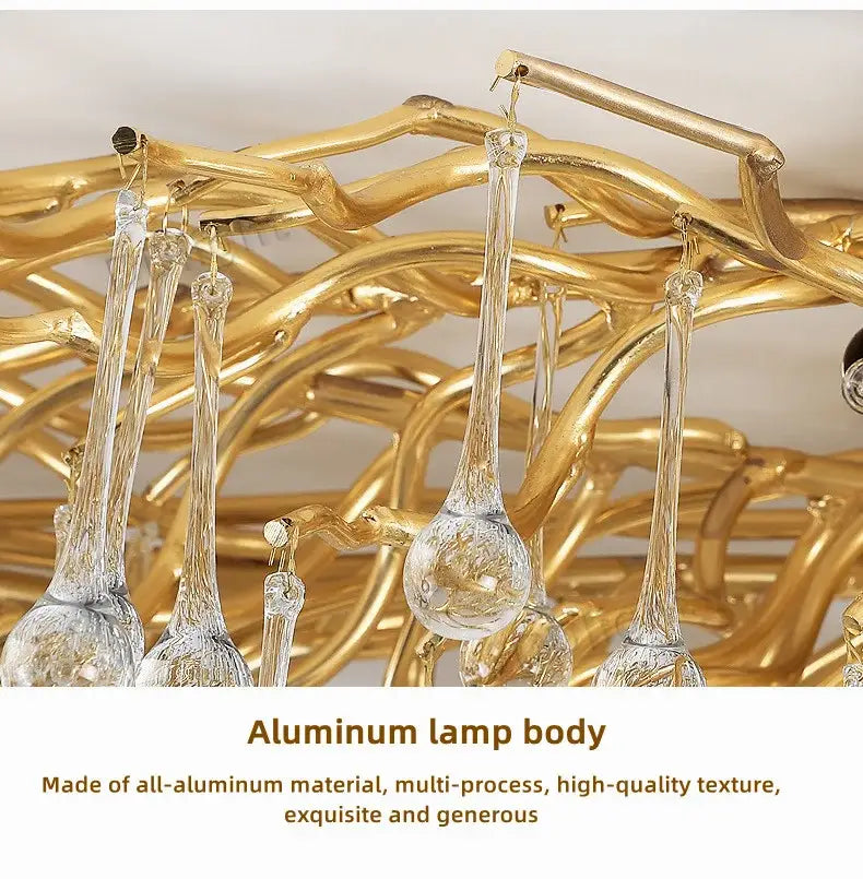 Golden aluminum luxury crystal chandelier with clear glass droplet pendants for elegant home decor by DecorBites™