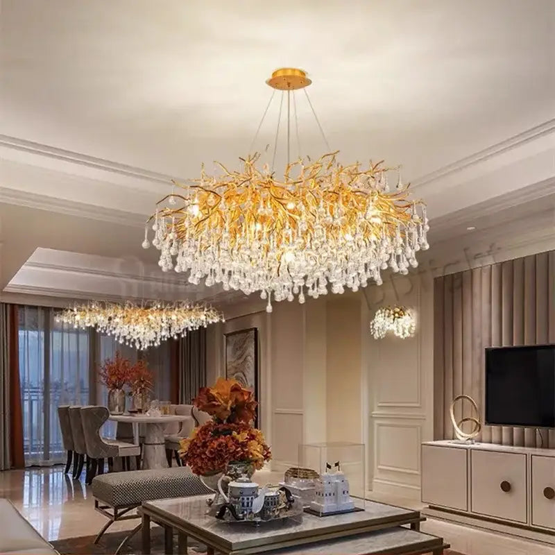 Decorbites luxury crystal chandelier featuring a golden branch design with dangling crystal droplets for home decor