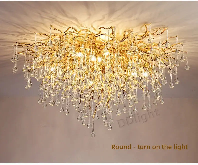 DecorBites luxury crystal chandelier with golden branch design and cascading clear crystal droplets for elegant home decor
