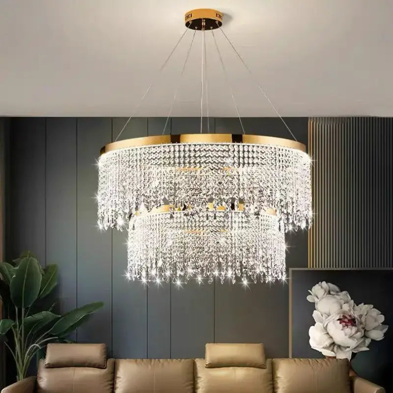Decorbites luxury crystal chandelier pendant light fixture with gold-toned metal and cascading clear crystals