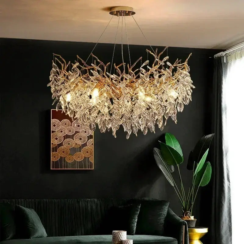 DecorBites luxury crystal chandelier with gold-toned leaf design and clear crystal droplets for elegant living room lighting