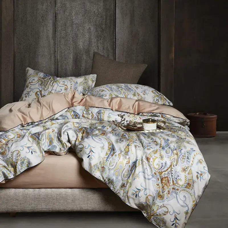 Luxurious cream-colored duvet cover with gold and blue paisley patterns and satin lining from decorbites™ egyptian cotton set