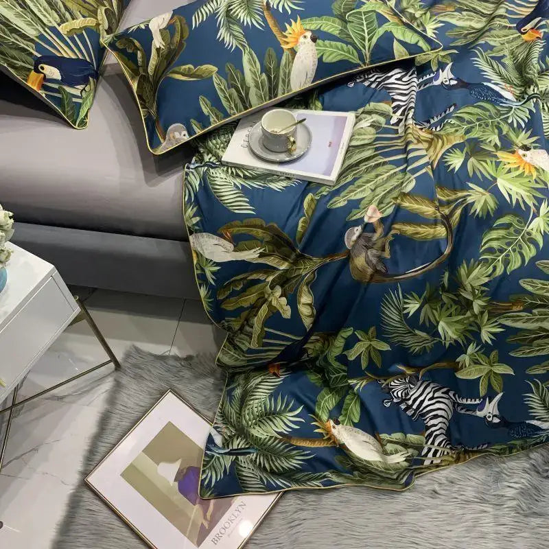 Decorbites luxury egyptian cotton duvet cover set in blue with vibrant green foliage toucans and zebras printed pattern