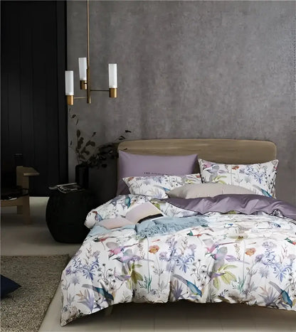 The decorbites luxury egyptian cotton duvet cover and pillowcases feature a botanical print with birds on white background