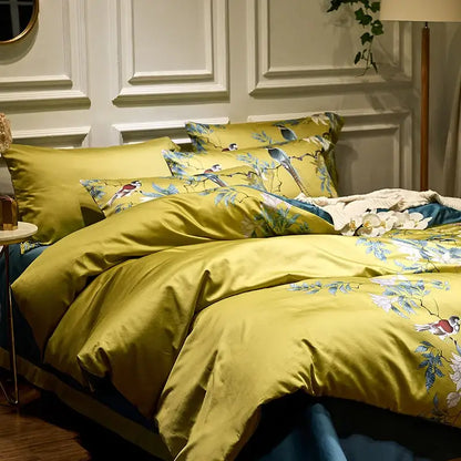 Olive green satin duvet cover with intricate blue white and gold bird and floral embroidery egyptian cotton pieces pillowcases