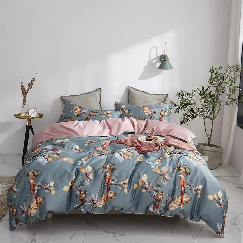 DecorBites luxury egyptian cotton duvet cover set with blue floral design and pink satin-like inner lining pillowcases