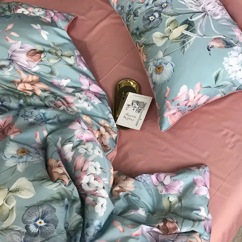 Decorbites luxury egyptian cotton duvet cover with soft teal floral design and matching pillowcases on satin fabric