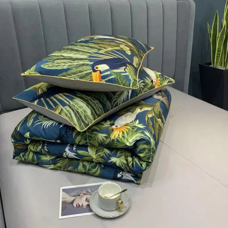 Decorbites luxury egyptian cotton duvet cover set with vibrant toucan and leaf patterns on deep blue fabric includes pillowcases