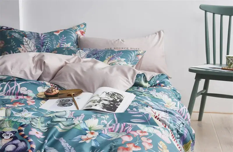 Teal satin duvet cover with vibrant tropical floral and monkey print in egyptian cotton luxury bedding set pieces pillowcases