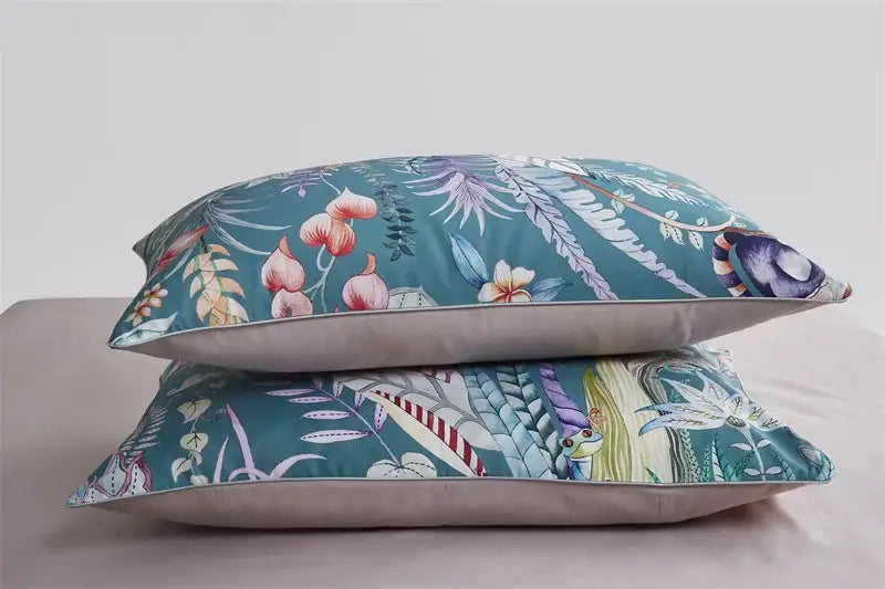 Teal floral-patterned pieces pillowcases with subtle stitching in DecorBites luxury egyptian cotton duvet cover set