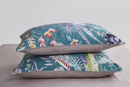Teal floral-patterned pieces pillowcases with subtle stitching in DecorBites luxury egyptian cotton duvet cover set
