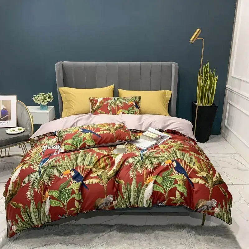 Vibrant red duvet cover and pillowcases set featuring toucans and parrots on soft Egyptian cotton fabric