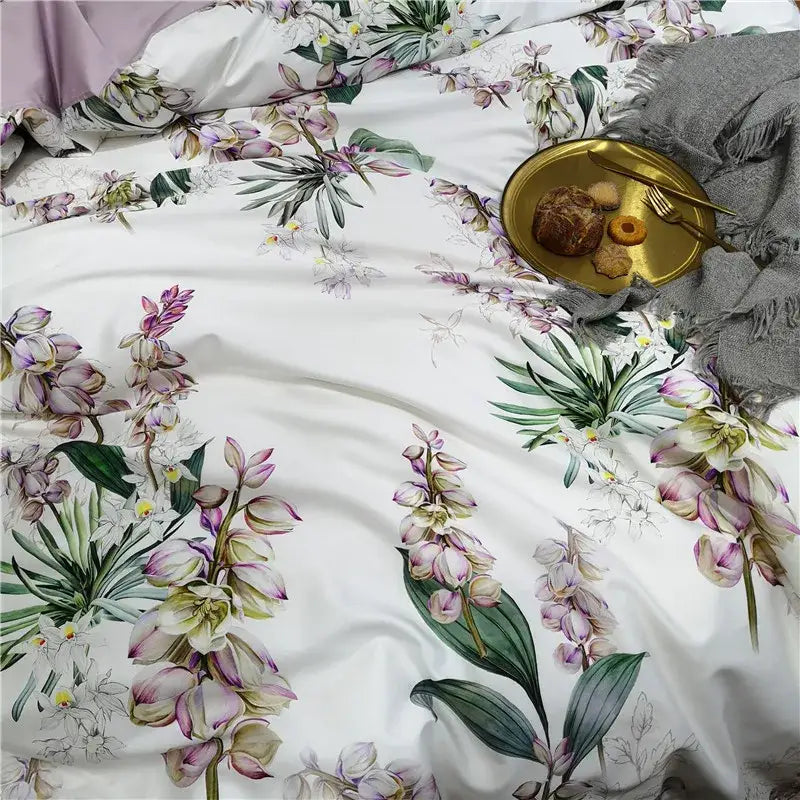White duvet cover with purple and green orchid print on soft satin egyptian cotton from DecorBites luxury bedding set