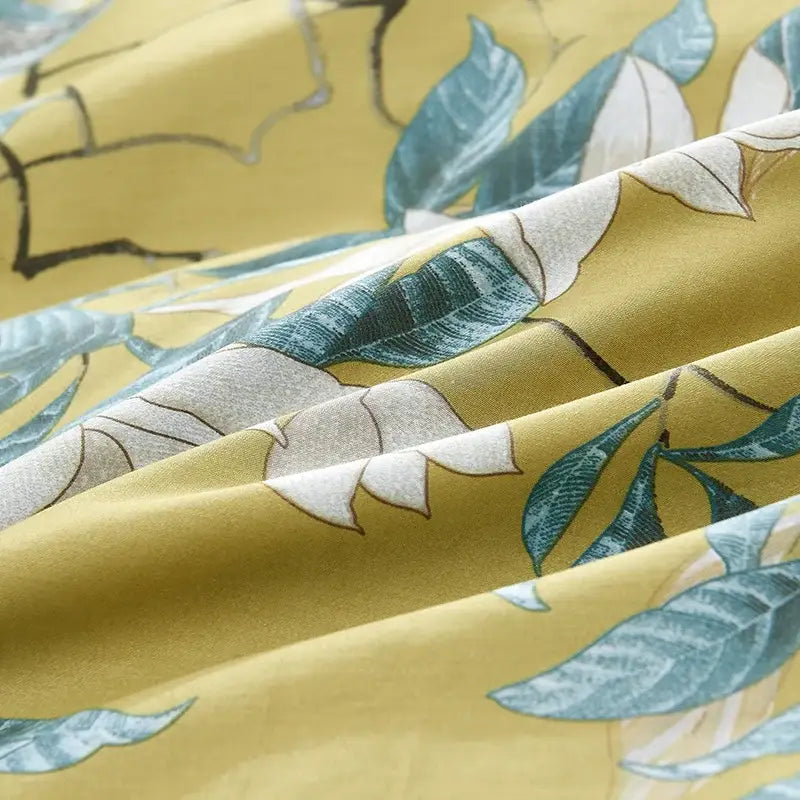 Yellow fabric duvet cover with teal and white leaves pattern from decorbites luxury egyptian cotton bedding set pieces pillowcases