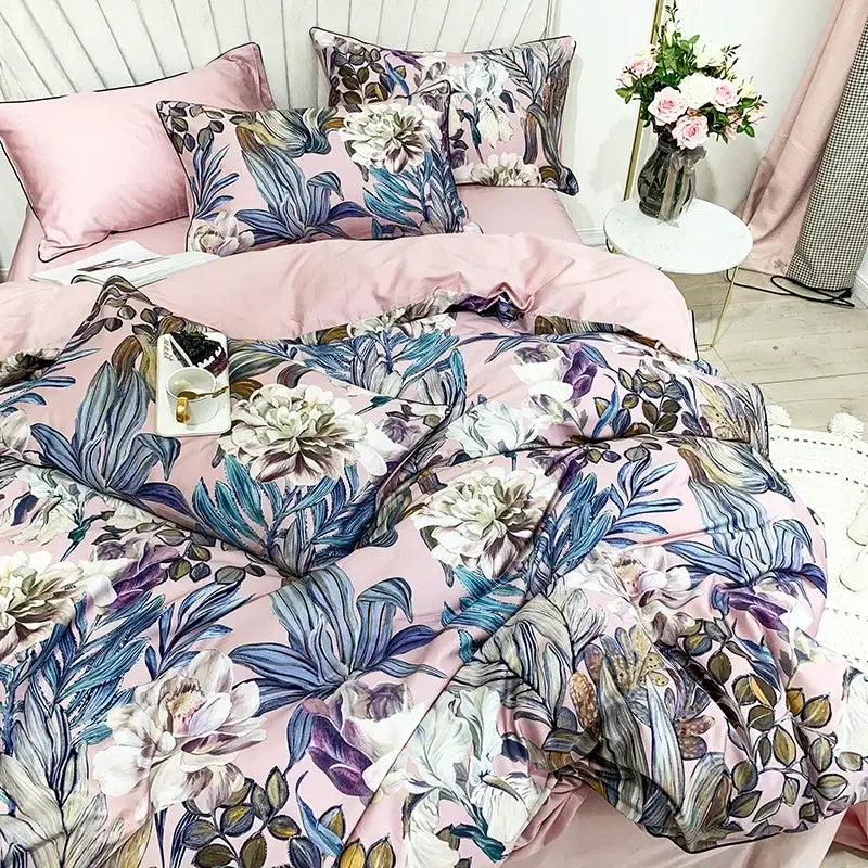 Pink floral duvet cover with large blue white purple and green blossoms in decorbites luxury egyptian cotton bedding set