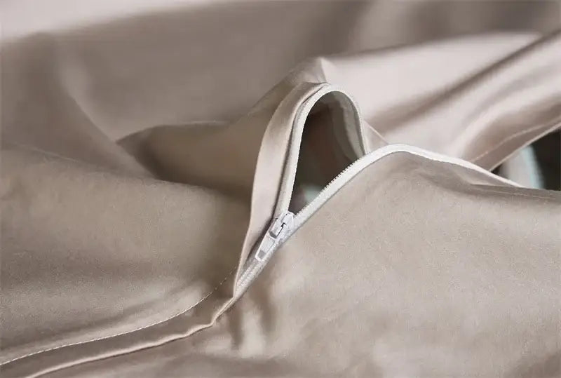 Beige satin duvet cover with subtle sheen and white zipper closure in decorbites luxury flamingo leaf bedding set queen king size