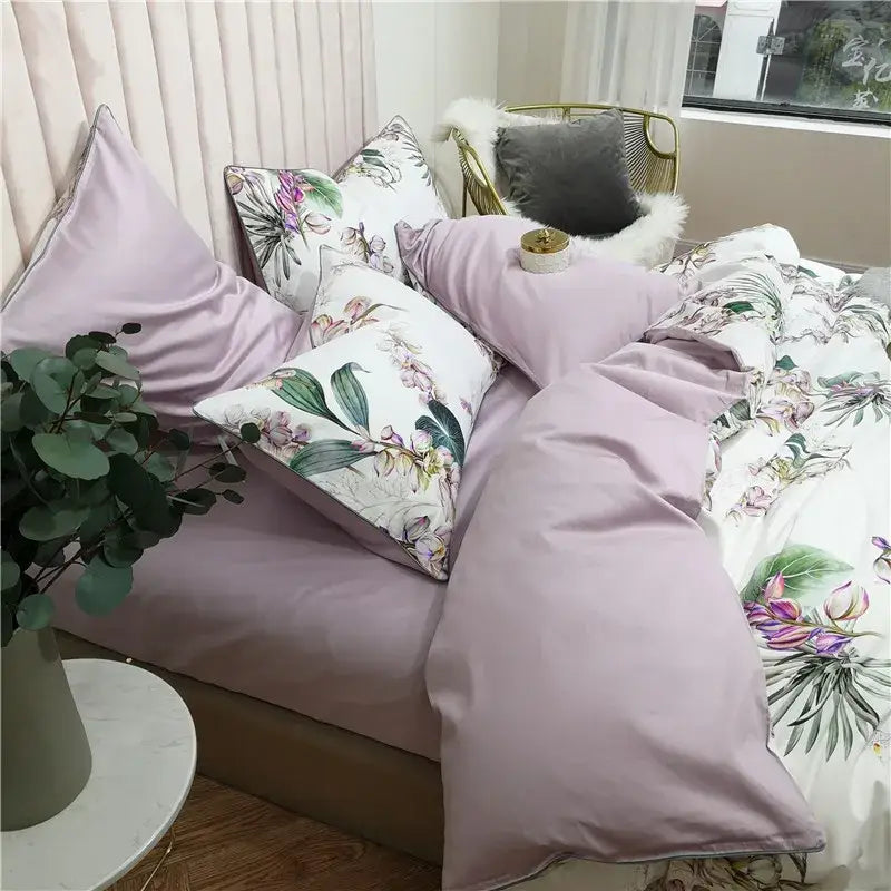 Lavender floral satin-like DecorBites luxury flamingo leaf duvet cover with botanical prints pieces pillowcases on white pillows
