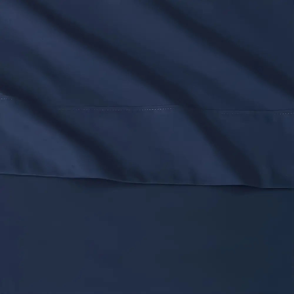Dark navy blue satin pillowcase from decorbites luxury bed sheet set with subtle sheen and precise stitching for hotel luxury use