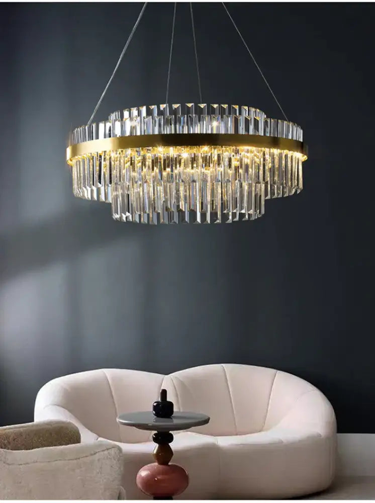 DecorBites luxury led crystal chandelier with a gold-toned frame and cascading clear crystal prisms for home decor