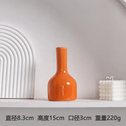 DecorBites luxury modern ceramic vase in glossy orange with a slender neck and rounded body for elegant decor