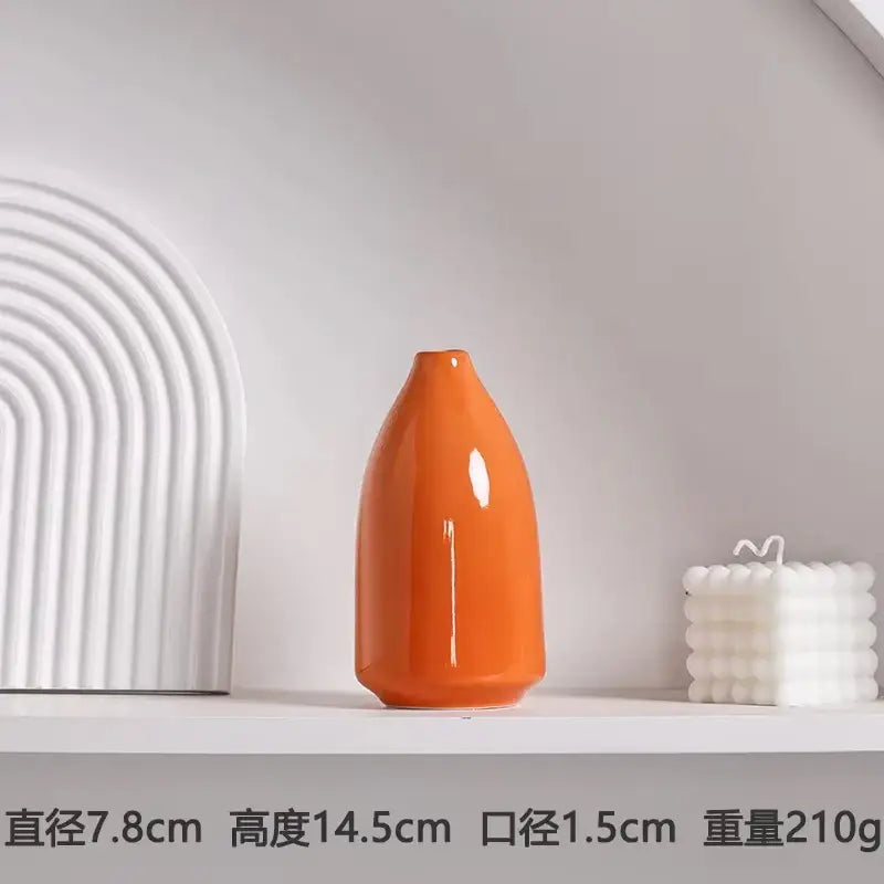 Decorbites luxury modern ceramic flower vase orange features a sleek glossy tapered ceramic vase in vibrant orange