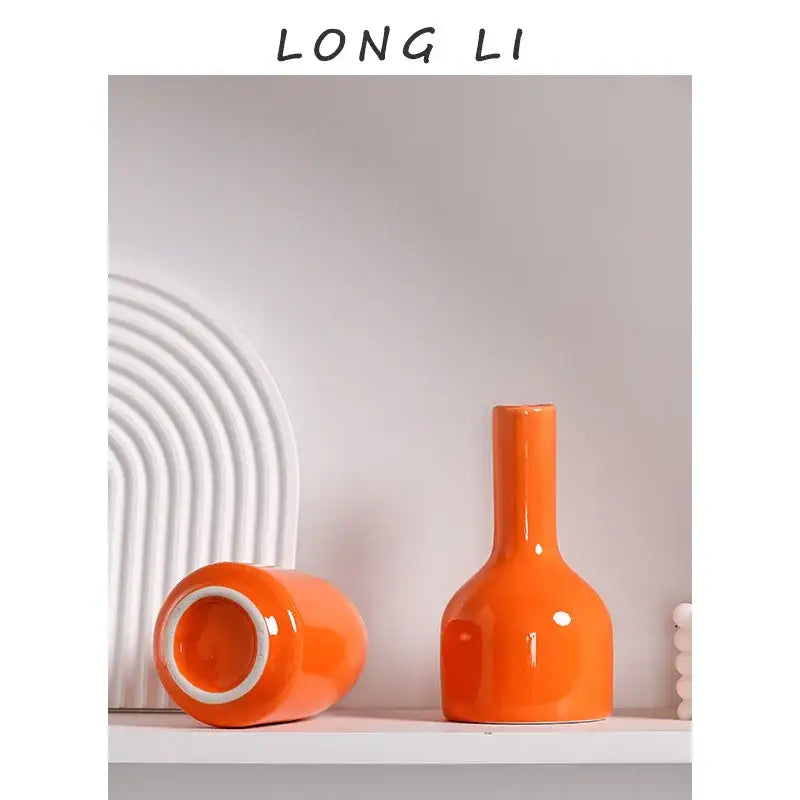 DecorBites luxury modern ceramic vase in vibrant orange with sleek glossy finish and slender neck for elegant decor