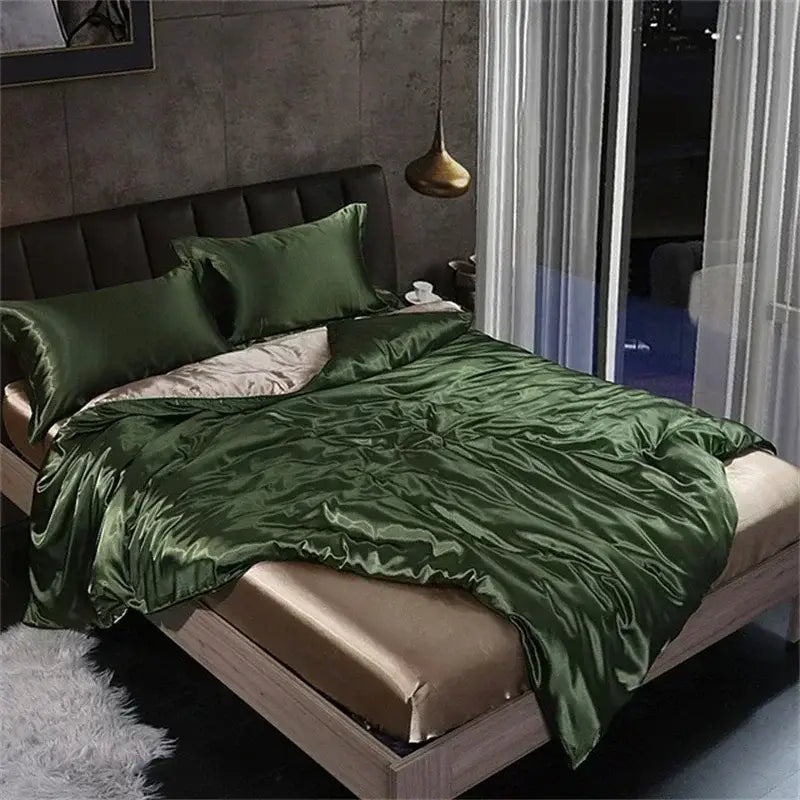 Emerald green satin mulberry silk duvet cover and pillowcases with cream inner lining in DecorBites luxury bedding set