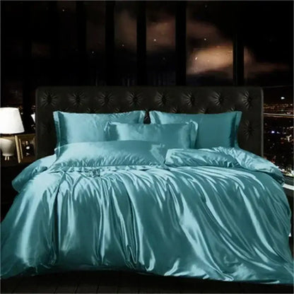 Teal satin duvet cover and pillows in decorbites luxury mulberry silk bedding set with tufted black headboard