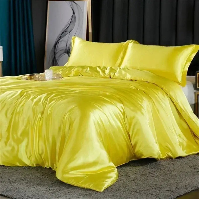 Vibrant yellow satin duvet cover with matching pillows in a decorbites luxury mulberry silk bedding set queen king size