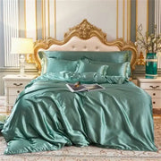 DecorBites™ luxury silk bedding set in teal satin with glossy finish and matching pcs duvet cover on gold-framed bed