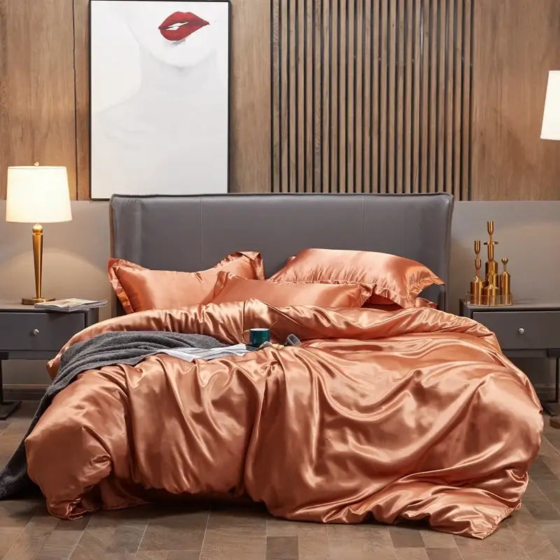 Copper satin four-piece DecorBites™ luxury bedding set with plush gray headboard includes pcduvet cover and pcbed sheet
